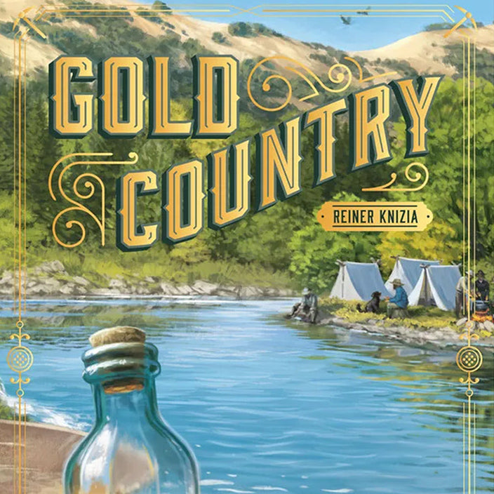 Board game box cover for 'Gold Country' by Reiner Knizia, featuring an illustrated scenic landscape with a river, mountains, tents, and a glass bottle filled with gold coins in the foreground.